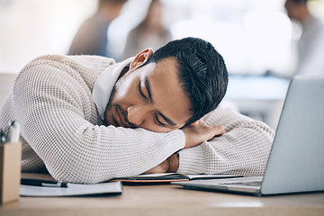 Image showing Tired, burnout and businessman sleeping on desk in corporate office after working on laptop. Stress, headache and male worker asleep with head on table with notebook and computer, exhausted from job