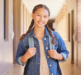 Image showing School, Backpack and portrait of girl student with education to learn, study and have knowledge. Happy, smile and child standing in the hallway or aisle with her bag for class in a high school campus