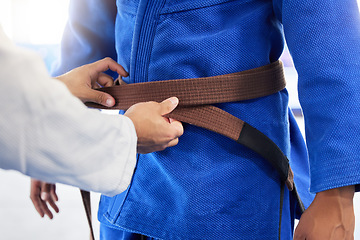 Image showing Karate brown belt, teacher and student fitness, taekwondo training, sports graduation and workout learning. Martial arts uniform, fighter and trainer getting ready in dojo gym, practice and exercise