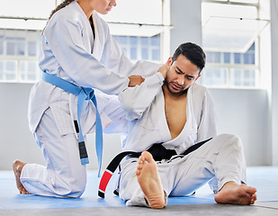 Image showing Karate, neck pain and man with an injury in sports training, exercise or body workout hurt in an accident. Problem, emergency and injured martial arts expert or athlete with muscle pain or bruise