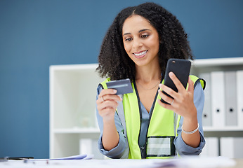 Image showing Woman, ecommerce and credit card with phone for shopping, payment and bank technology in office. Happy black woman, online shopping and fintech at architecture, construction or contractor workplace