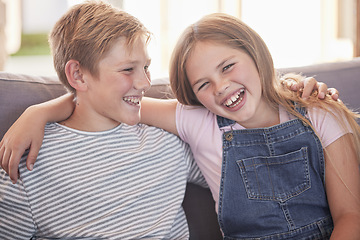 Image showing Children, siblings and hug on sofa laughing for sister and brother fun relaxing together at home. Happy portrait smile of kids in funny sibling bonding and enjoying time on the living room couch