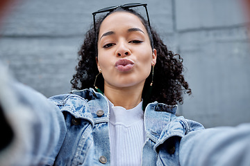 Image showing City, woman taking a selfie and face with pov outside for freedom or peace. Fashion or glasses, positive or casual and happy young female model pose for confidence with a pout facial expression