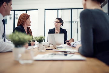 Image showing Meeting, planning and business people with laptop in office for creative, collaboration and strategy discussion. Teamwork, brainstorming and designer team sharing goal, vision or design proposal plan