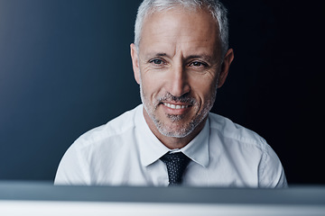 Image showing Thinking, brainstorming and senior businessman working on a project with a computer or technology. Career, idea and professional mature male person doing corporate research on a desktop in workplace.