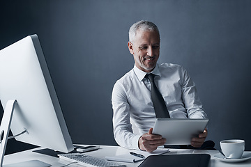 Image showing Tablet, accountant and elderly business man in studio isolated on a dark background mockup space. Technology, happy and manager at desk, executive or auditor working on research, email or reading app