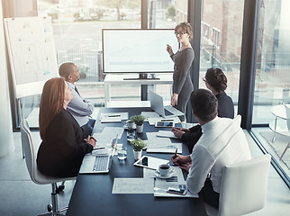 Image showing Business meeting, monitor and woman presentation of financial charts, graphs and accounting profit, increase or sales. Finance, statistics and accountant people or manager show timeline on tv screen