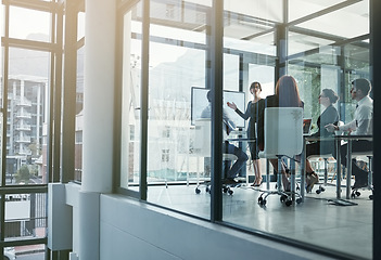 Image showing Speaker, businesswoman or business people in a presentation for sales report or financial analysis. Data analytics, manager or leader planning in a corporate meeting on screen monitor in mentorship