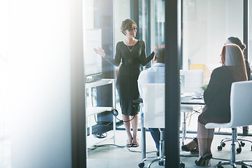 Image showing Business meeting, presentation and woman, manager or speaking for financial update, questions and discussion. Finance, corporate and people, accountant or clients listening to manager proposal pitch