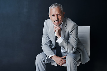 Image showing Portrait of senior lawyer on chair with smile, confidence and mockup space on dark background in studio. Pride, professional career and happy executive attorney mature businessman or law firm boss.