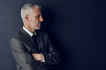 Image showing Senior executive, business man and arms crossed, confidence and management on dark background. Male CEO, corporate director in suit and ambition, mockup space with empowerment and career in studio
