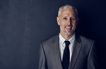 Image showing Mockup, confidence and smile, portrait of businessman in suit and pride on dark background. Boss, ceo and business owner with professional career, happy senior director with executive management job.