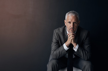 Image showing Mockup, chair and portrait of serious businessman, lawyer or attorney with confidence on dark background and studio space. Boss, ceo and professional business owner, proud senior director at law firm
