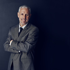 Image showing Smile, confidence and portrait of businessman in mockup, arms crossed and pride on dark background. Boss, ceo and happy business owner with professional career, senior model in suit in executive job