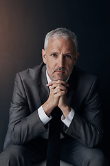 Image showing Boss, chair and serious portrait of lawyer, attorney or businessman with ceo on dark background in studio. Confidence, pride and legal business owner, proud senior executive director at law firm.