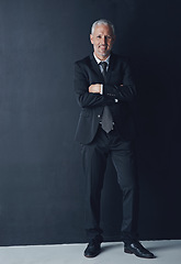 Image showing Senior executive, business man and arms crossed with full body portrait, confidence and management on dark background. Male CEO, corporate director in suit and ambition, empowerment and career