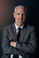 Image showing Portrait, smile and businessman with confidence, lawyer or attorney on dark background in studio. Proud boss, ceo and professional business owner, happy senior director at law firm with arms crossed.