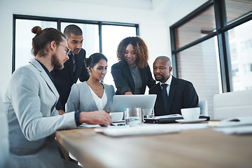 Image showing Business people, finance and team with a laptop, meeting or financial planning with investments, trading and teamwork. Staff, men or women with a pc, partnership or collaboration with budget or email