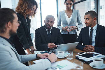 Image showing Meeting, planning and business people with laptop in office for brainstorming idea, strategy and collaboration. Corporate, teamwork and men and women working on report, group project and proposal