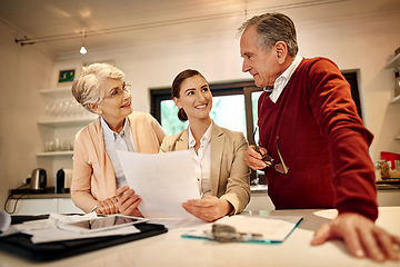 Image showing Senior couple, lawyer and documents for budget planning, bills or retirement plan at home. Happy elderly man and woman in finance discussion with consultant or financial advisor for paperwork or loan