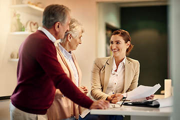 Image showing Senior couple, lawyer and documents in discussion for budget or retirement plan at home. Happy elderly man and woman with consultant or financial advisor and paperwork for investment planning or loan