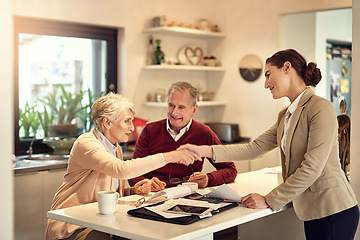 Image showing Senior couple, accountant and handshake in finance, budget or agreement for consultation at home. Happy elderly man and woman shaking hands with consultant lawyer for financial planning or investment