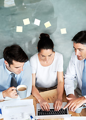 Image showing Business people, team and typing on laptop in office for planning, collaboration and accounting. Men and woman together at desk with tech and paperwork for tax, budget or brainstorming strategy above