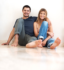 Image showing Portrait, happy and couple on the ground, love and quality time with romance, happiness and relationship. Romantic, man or woman on the floor, relax and cheerful with hug, loving together and bonding