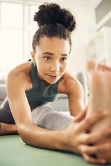 Image showing Foot, stretching and yoga by woman on living room floor, training or mental health exercise at home. Feet, stretch and lady with flexible fitness or pilates, workout or balance or wellness meditation