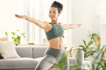 Image showing Body, stretching and happy woman with yoga pose in a living room for balance, mental health and wellness at home. Arms, stretch and female smile for pilates, fitness and flexible training or workout