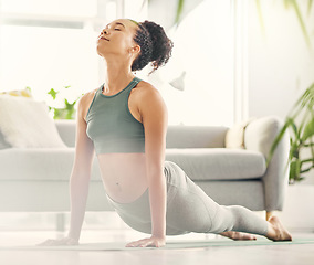 Image showing Yoga, wellness and calm woman at home with zen, relax and back stretching for health in a living room. Young female person, apartment and lounge with pilates and flexibility exercise to meditate