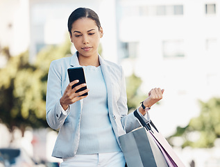 Image showing Business woman, phone and shopping bag in city for social media, communication or networking outdoors. Female person, employee or shopper on mobile smartphone app for online chat in an urban town