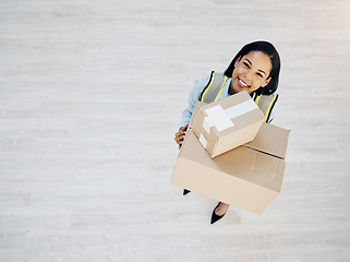 Image showing Boxes, portrait and a courier or delivery woman from above for logistics, cargo or shipping industry. Happy female worker with cardboard box or package for supply chain or distribution service mockup