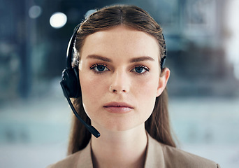 Image showing Call center portrait, face or woman in telecom, CRM or telemarketing office for customer services. Microphone headset, ready or serious female sales agent in tech support help desk for consulting