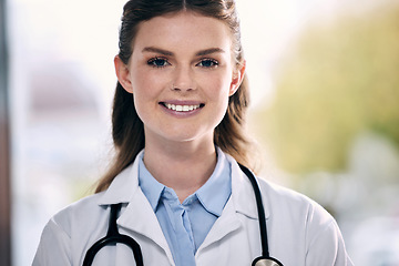 Image showing Portrait, happy woman or confident doctor in hospital to help with trust, smile or positive mindset. Face, wellness or friendly medical healthcare professional smiling with nursing success in clinic