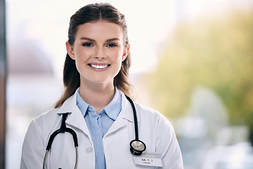 Image showing Portrait, happy woman or proud doctor in hospital to help with confidence, smile or positive mindset. Face, mockup or friendly medical healthcare professional smiling with nursing success in clinic