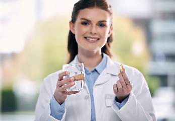 Image showing Portrait, water glass or happy doctor in hospital with pills or supplements for healthcare vitamins or medicine. Smile, medication tablets or medical worker giving cure for allergy, anxiety or pain