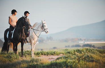 Image showing Horse riding, freedom and view with friends in nature on horseback enjoying their hobby during a summer morning. Countryside, equestrian and female riders outdoor together for adventure or bonding