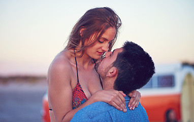 Image showing Love, couple and kiss at the beach on date, vacation or road trip in summer with freedom, together and romantic adventure. People, dating and support in relationship, happiness or boyfriend and girl