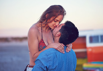 Image showing Couple, kiss and love at the beach on date, vacation or road trip in summer with partner, together and romantic adventure. People, dating and support in relationship, happiness or boyfriend and girl