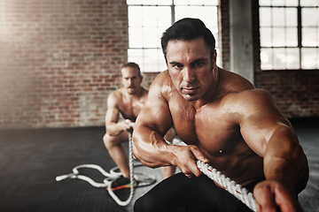 Image showing Men, gym and pull rope for exercise with strong muscle, coaching or teamwork for health, self care and together. Body builder partnership, focus and tug of war for workout, health or support on floor