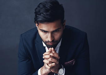 Image showing Entrepreneur, thinking or Indian man with stress, depression and challenge on a dark studio background. Male person, bankruptcy or agent confused, mistake or professional with worry, decision or fail