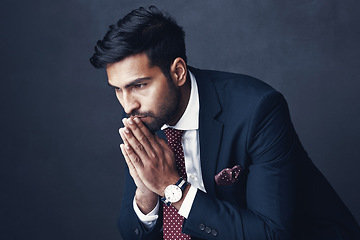 Image showing Corporate, thinking and Indian man with stress, worry and employee against a dark studio background. Male person, entrepreneur and agent confused, mistake and anxious with depression, fail or anxiety