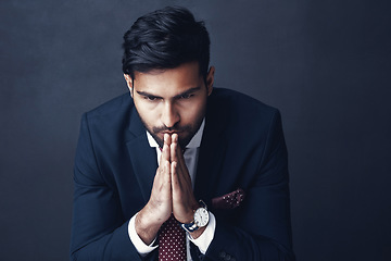 Image showing Corporate, thinking and Indian man with stress, confused and employee against a dark studio background. Male person, entrepreneur and agent with worry, anxiety and business owner with contemplation