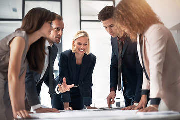 Image showing Business people, corporate meeting with paperwork and planning ideas in collaboration on project proposal. Teamwork, strategy and b2b workshop, men and women with target management in happy office.