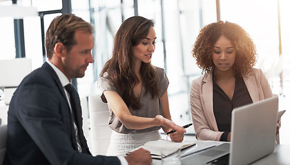 Image showing Business people, meeting with opinion and laptop, ideas in collaboration on project feedback with coaching. Teamwork, online review and research, man and women with target management in modern office