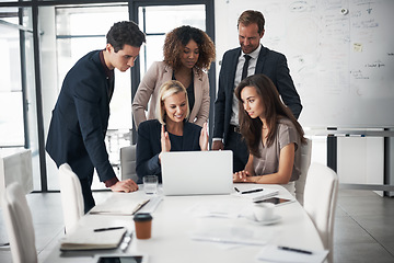 Image showing Business people, meeting with paperwork and laptop training with ideas in job collaboration on project proposal. Teamwork, strategy and coaching workshop, men and women in target management at office