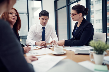 Image showing Discussion, brainstorming and business people in meeting in the office for planning with research. Collaboration, teamwork and group of designers working on strategy or project in workplace boardroom