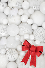 Image showing Christmas White Bauble Decorations and Red Bow Background