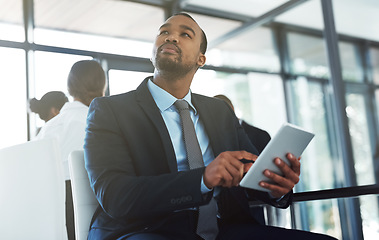 Image showing Tablet, lawyer and thinking black man in office for business, research or online app. Serious, technology and corporate African attorney with idea, planning or solution for problem solving at work.